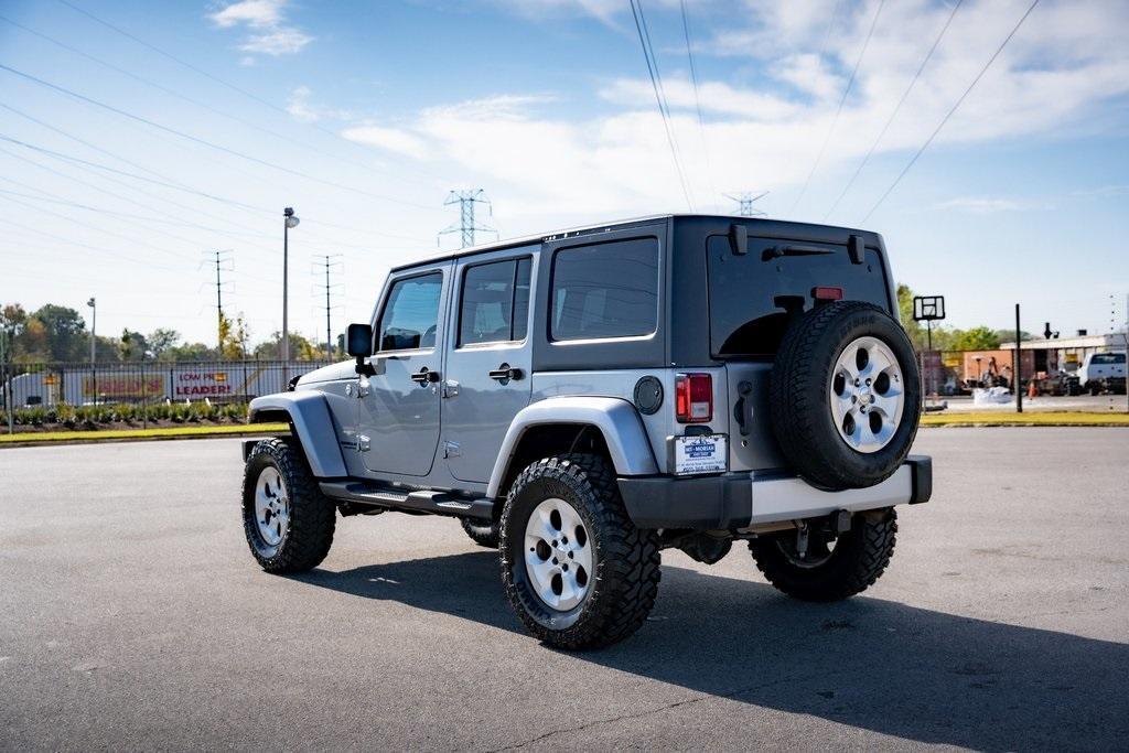 used 2015 Jeep Wrangler Unlimited car, priced at $20,456