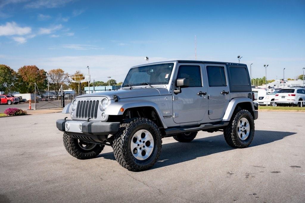 used 2015 Jeep Wrangler Unlimited car, priced at $20,456