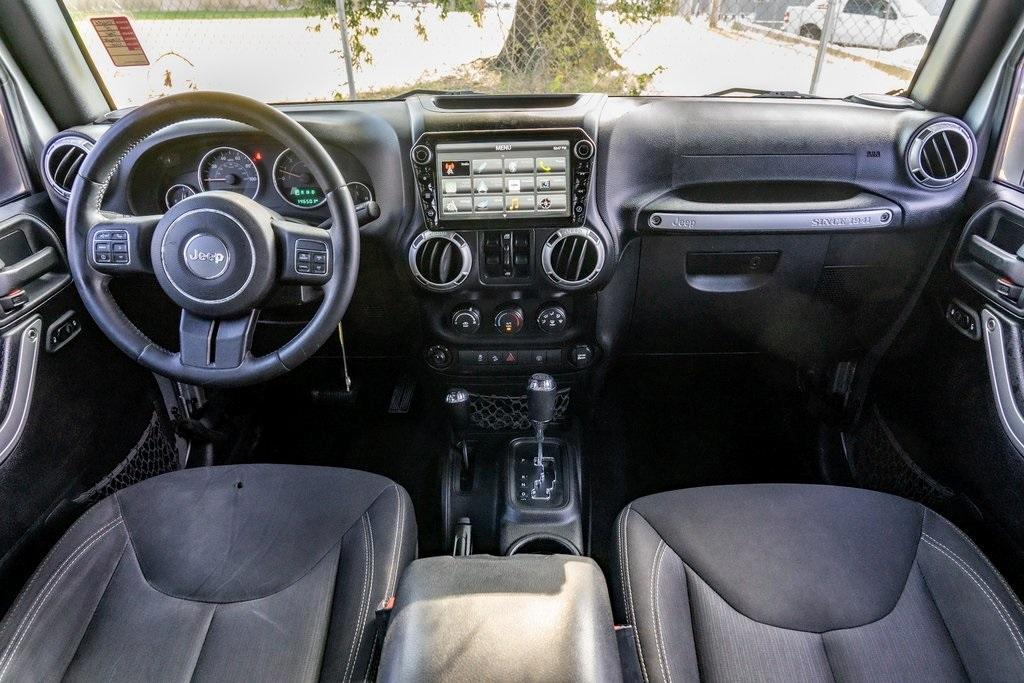 used 2015 Jeep Wrangler Unlimited car, priced at $20,456