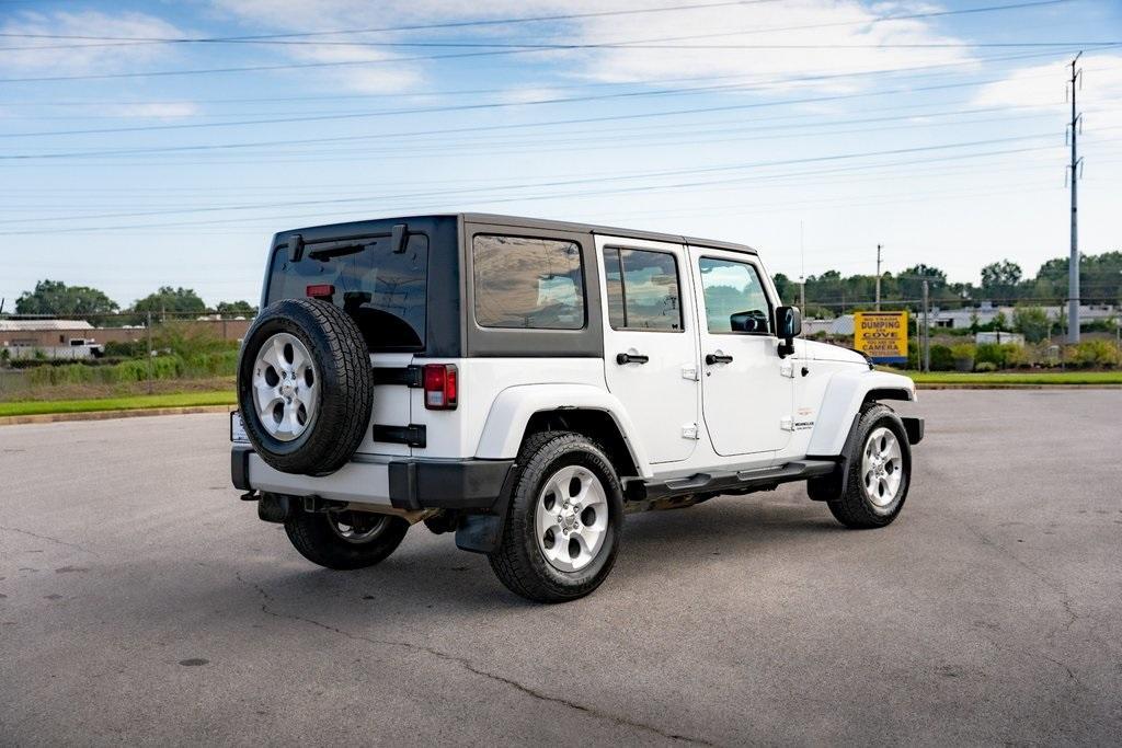 used 2015 Jeep Wrangler Unlimited car, priced at $16,959