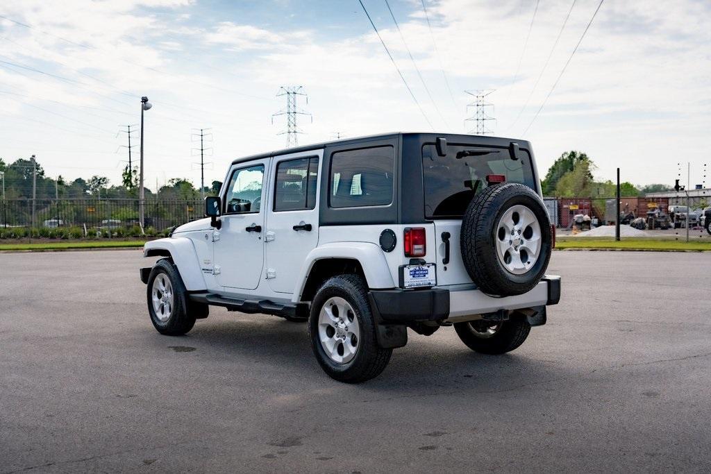 used 2015 Jeep Wrangler Unlimited car, priced at $16,959