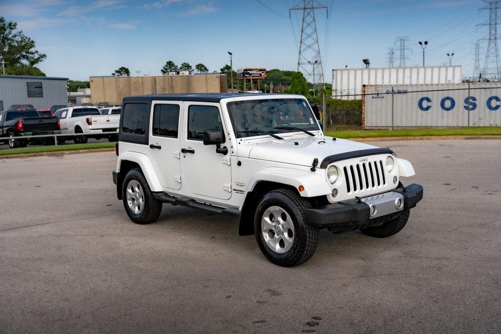 used 2015 Jeep Wrangler Unlimited car, priced at $16,959