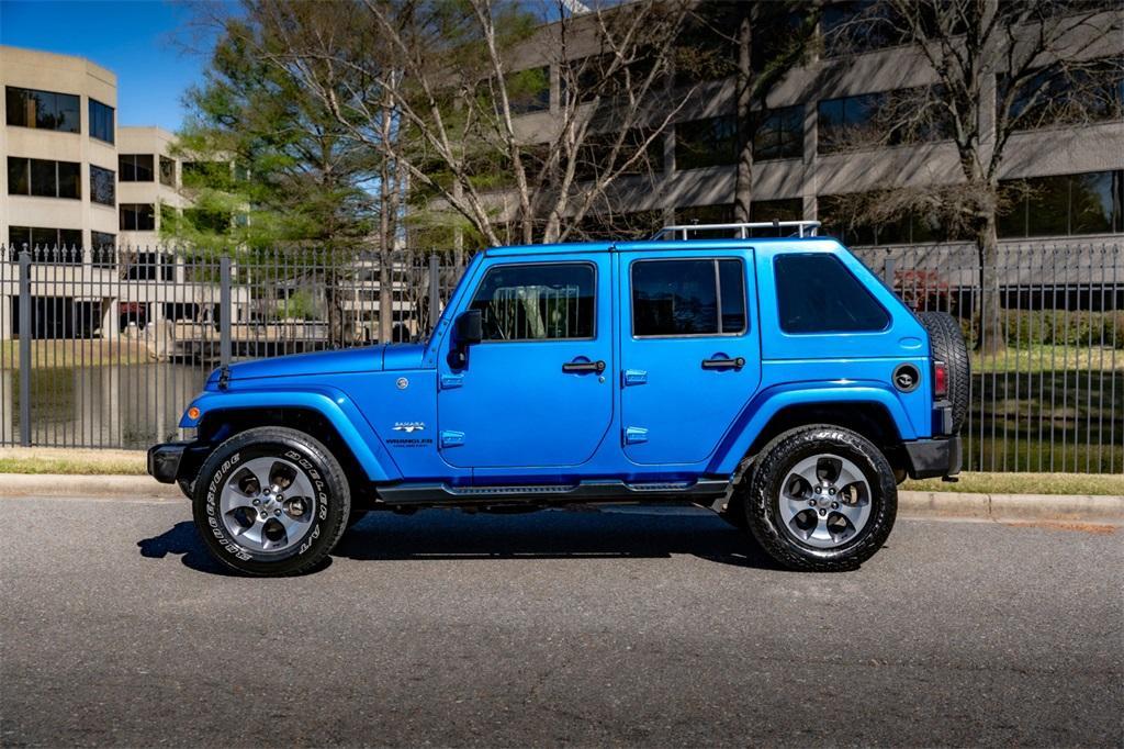 used 2016 Jeep Wrangler Unlimited car, priced at $21,977