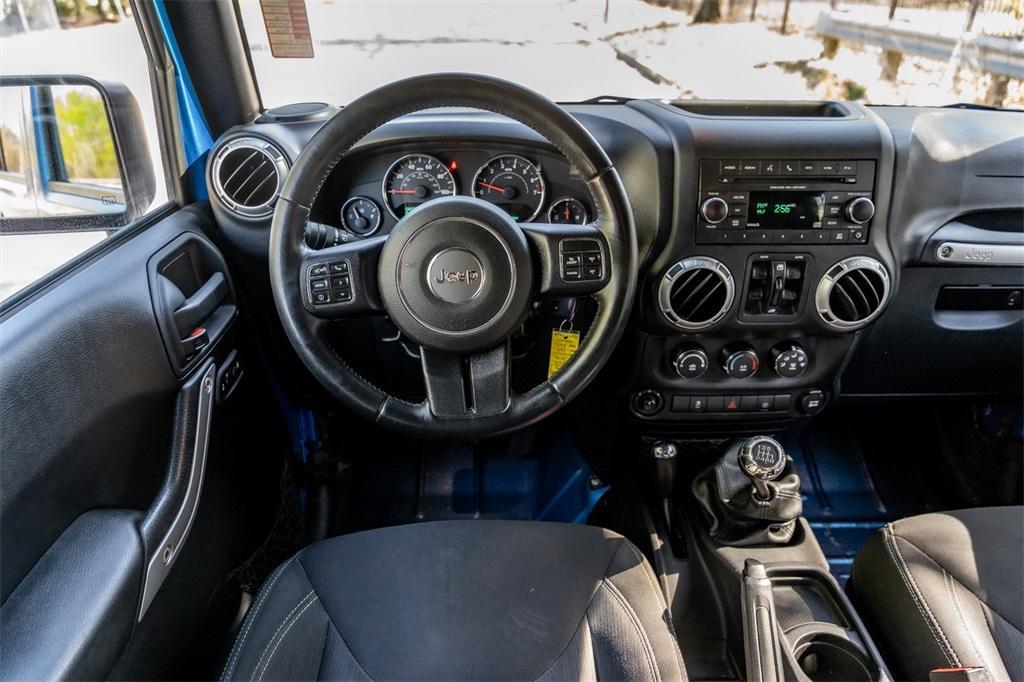 used 2016 Jeep Wrangler Unlimited car, priced at $21,977