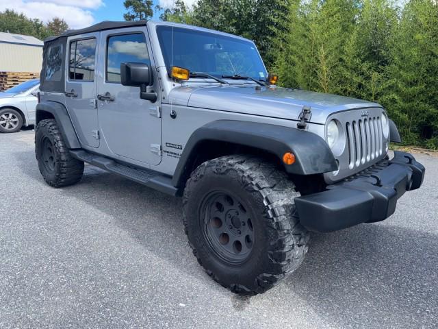 used 2014 Jeep Wrangler Unlimited car, priced at $13,495