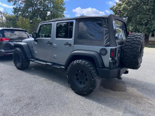 used 2014 Jeep Wrangler Unlimited car, priced at $13,495