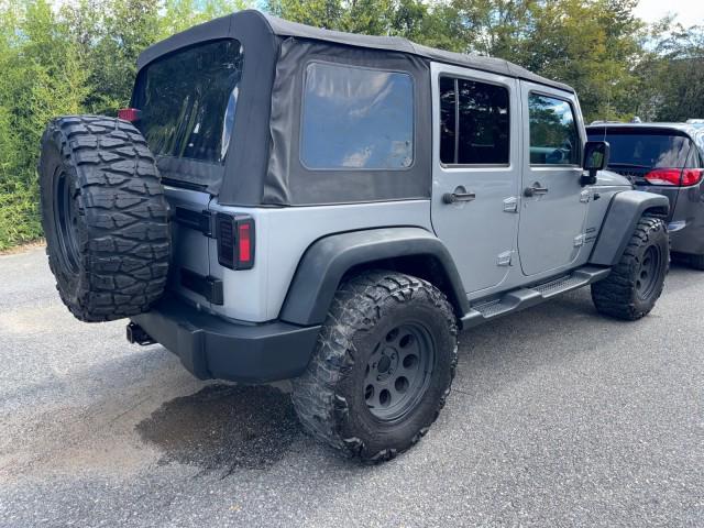 used 2014 Jeep Wrangler Unlimited car, priced at $13,495