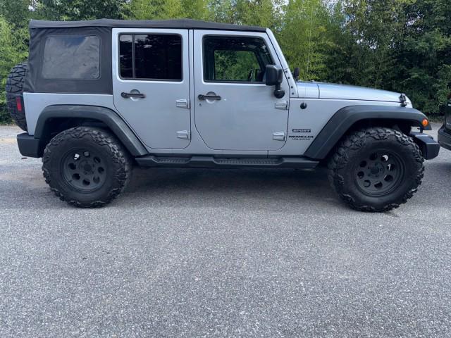 used 2014 Jeep Wrangler Unlimited car, priced at $13,495