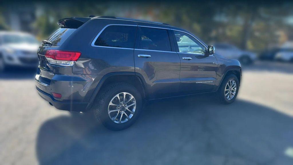 used 2014 Jeep Grand Cherokee car, priced at $7,995