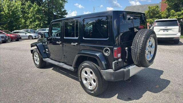 used 2014 Jeep Wrangler Unlimited car, priced at $12,495