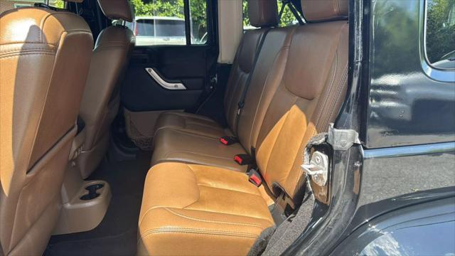 used 2014 Jeep Wrangler Unlimited car, priced at $12,495