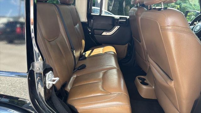 used 2014 Jeep Wrangler Unlimited car, priced at $12,495