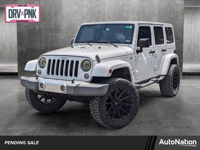 used 2016 Jeep Wrangler Unlimited car, priced at $25,991