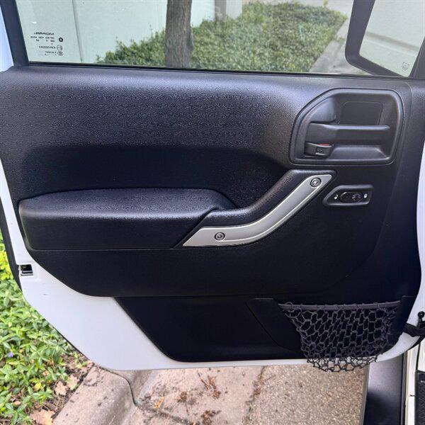 used 2016 Jeep Wrangler Unlimited car, priced at $25,772