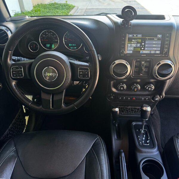 used 2016 Jeep Wrangler Unlimited car, priced at $25,772