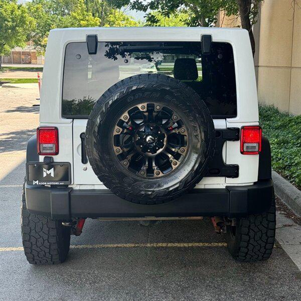 used 2016 Jeep Wrangler Unlimited car, priced at $25,772