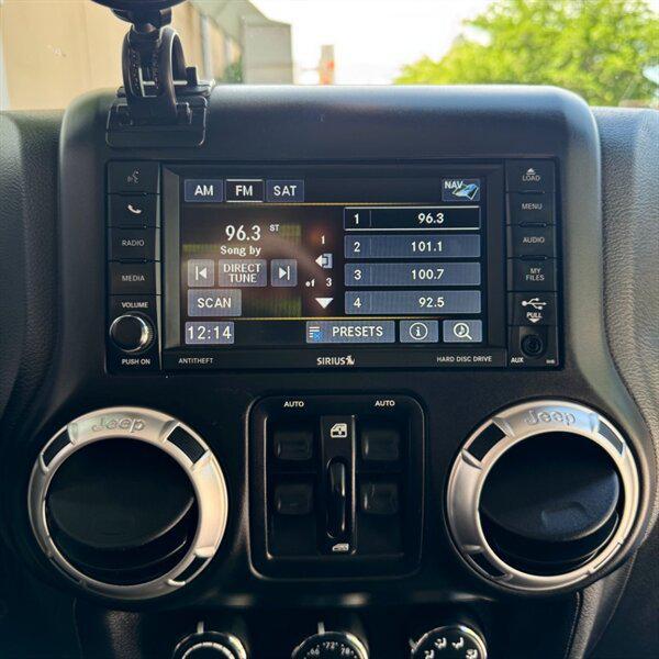 used 2016 Jeep Wrangler Unlimited car, priced at $25,772