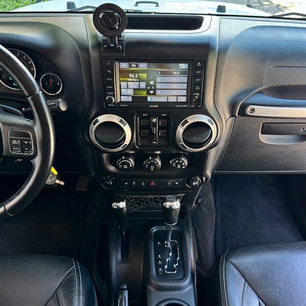 used 2016 Jeep Wrangler Unlimited car, priced at $25,772