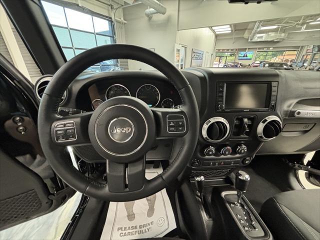 used 2015 Jeep Wrangler Unlimited car, priced at $28,295