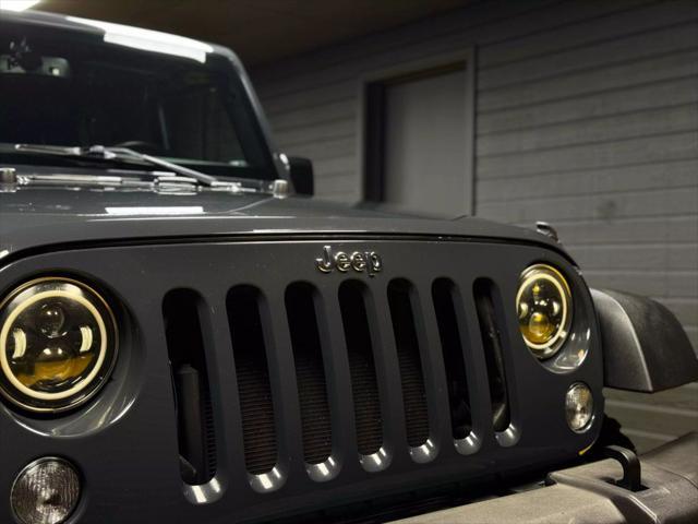 used 2016 Jeep Wrangler Unlimited car, priced at $22,450