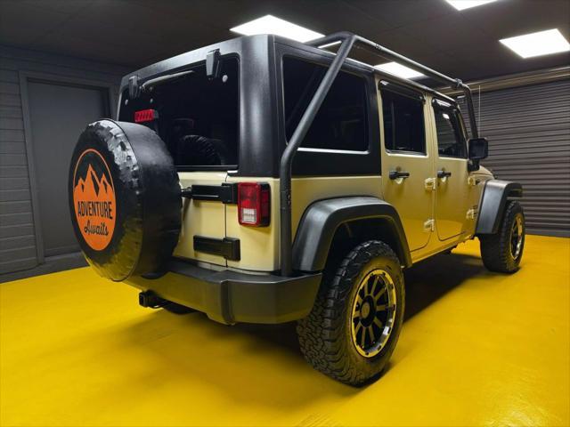 used 2011 Jeep Wrangler Unlimited car, priced at $14,999
