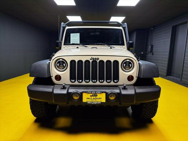 used 2011 Jeep Wrangler Unlimited car, priced at $14,999