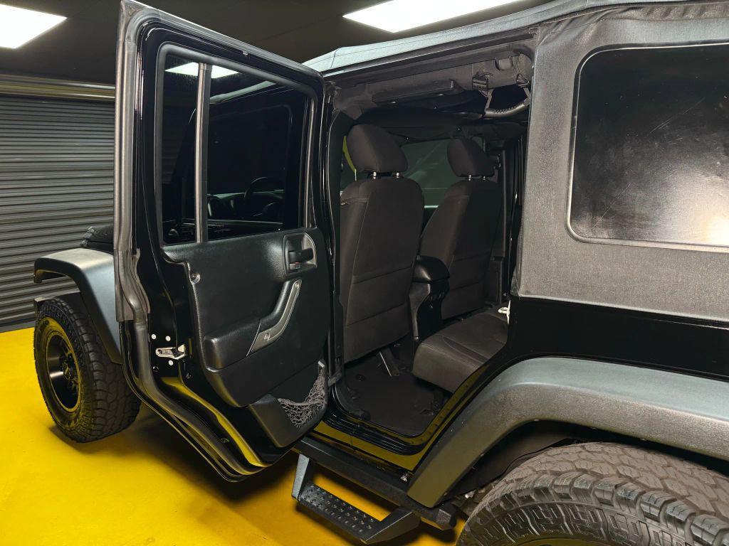 used 2018 Jeep Wrangler JK Unlimited car, priced at $19,997