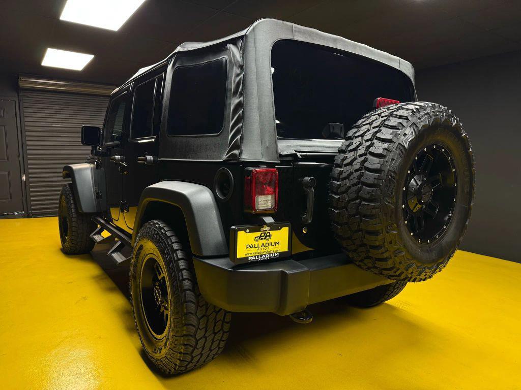 used 2018 Jeep Wrangler JK Unlimited car, priced at $19,997