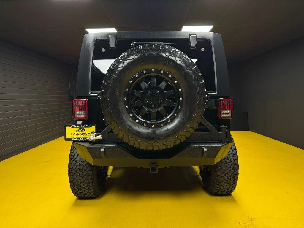 used 2015 Jeep Wrangler Unlimited car, priced at $21,999