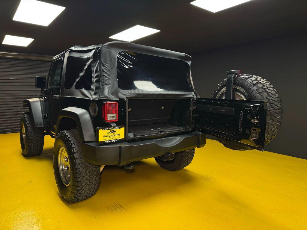 used 2013 Jeep Wrangler car, priced at $15,799