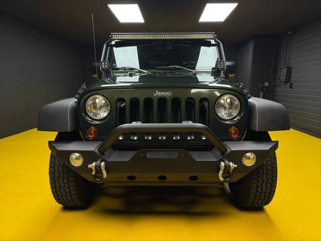 used 2010 Jeep Wrangler Unlimited car, priced at $15,500