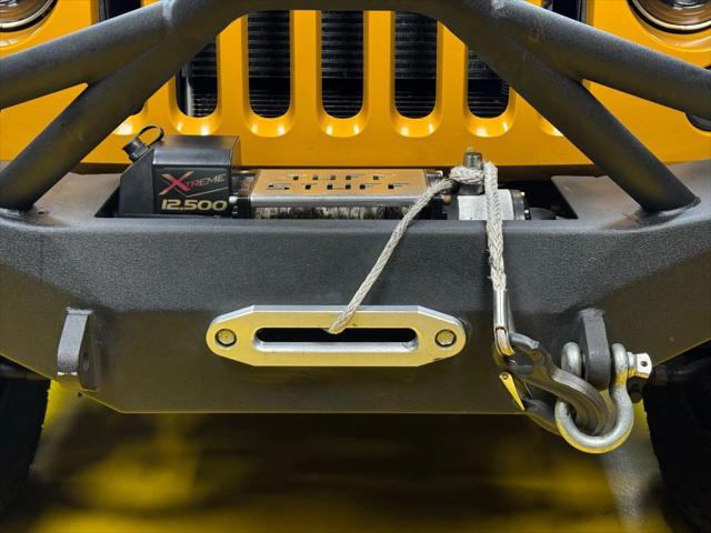 used 2014 Jeep Wrangler Unlimited car, priced at $18,997
