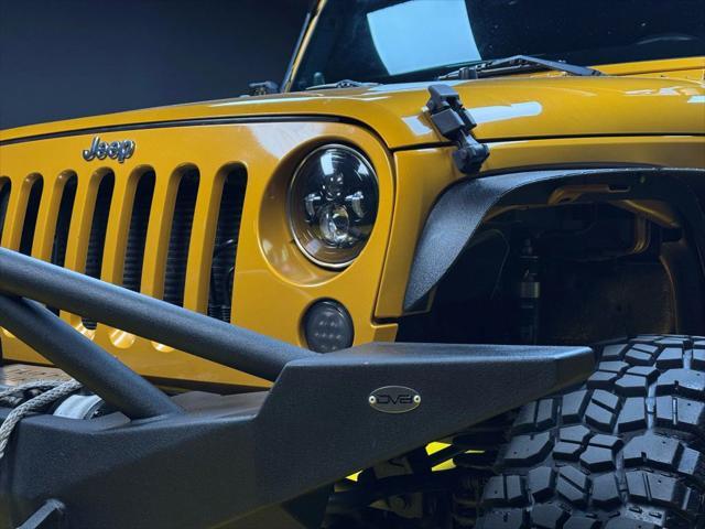 used 2014 Jeep Wrangler Unlimited car, priced at $18,997