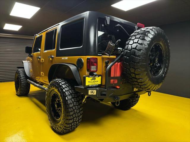used 2014 Jeep Wrangler Unlimited car, priced at $18,997
