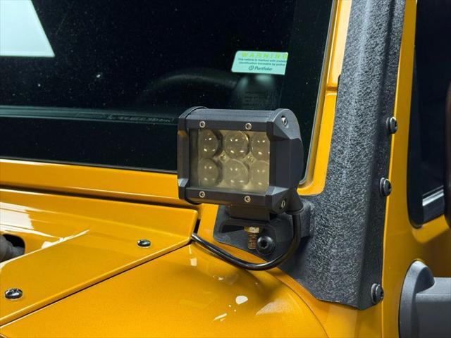 used 2014 Jeep Wrangler Unlimited car, priced at $18,997