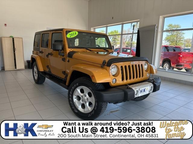 used 2014 Jeep Wrangler Unlimited car, priced at $21,348