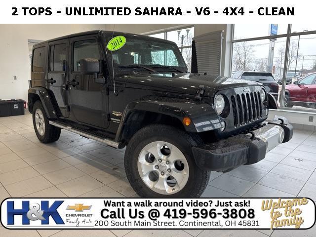 used 2014 Jeep Wrangler Unlimited car, priced at $16,497