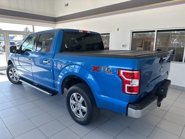 used 2019 Ford F-150 car, priced at $26,523