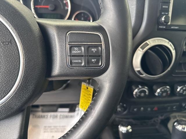 used 2014 Jeep Wrangler Unlimited car, priced at $16,388
