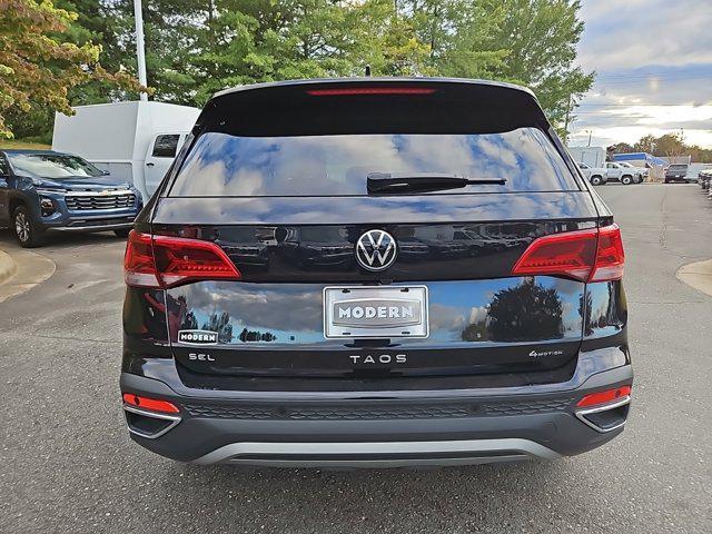 used 2023 Volkswagen Taos car, priced at $23,200