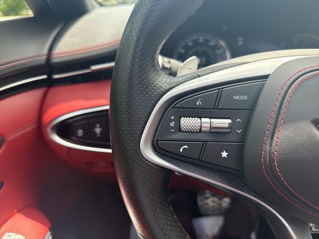 used 2023 Genesis GV70 car, priced at $47,202