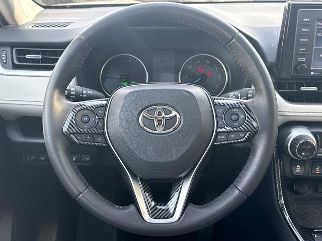 used 2021 Toyota RAV4 Hybrid car, priced at $27,465