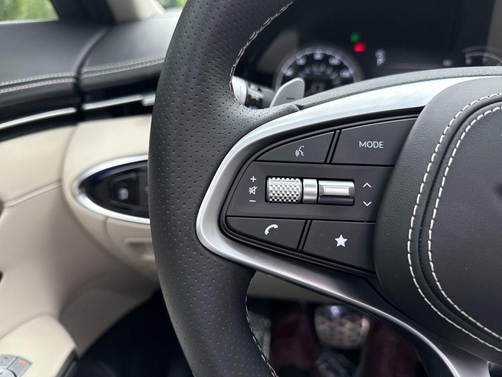 used 2025 Genesis GV70 car, priced at $58,250