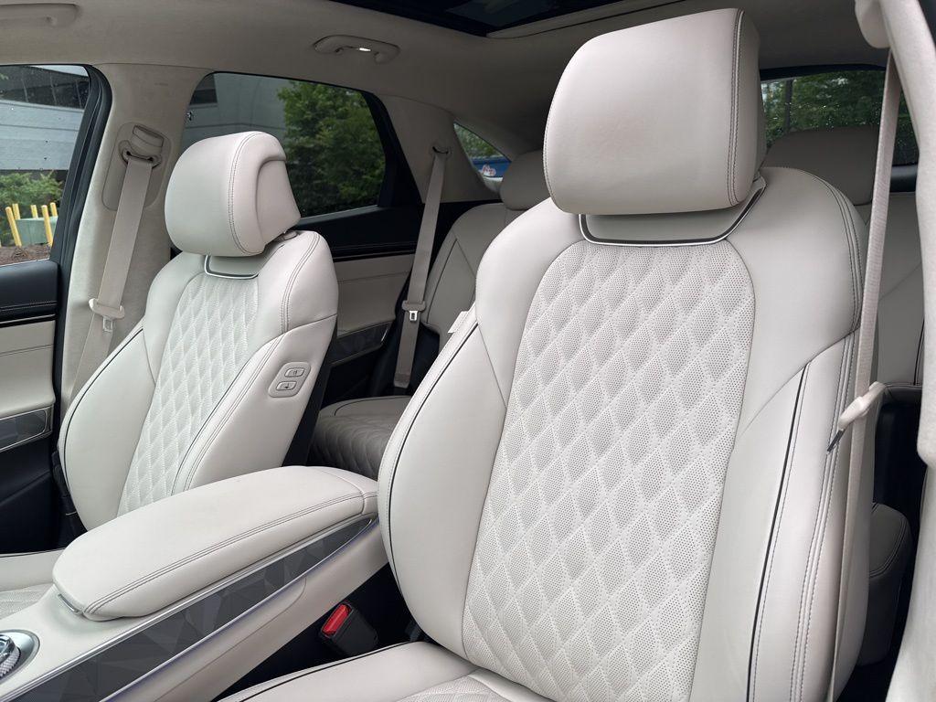 used 2025 Genesis GV70 car, priced at $58,250