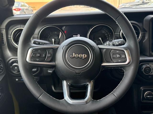 used 2023 Jeep Wrangler 4xe car, priced at $31,553