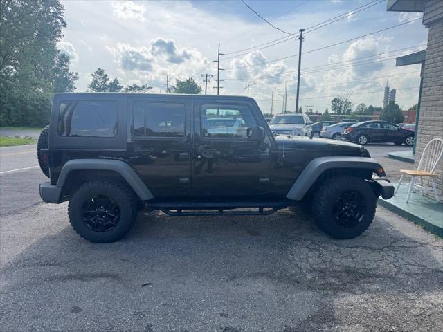 used 2014 Jeep Wrangler Unlimited car, priced at $11,995
