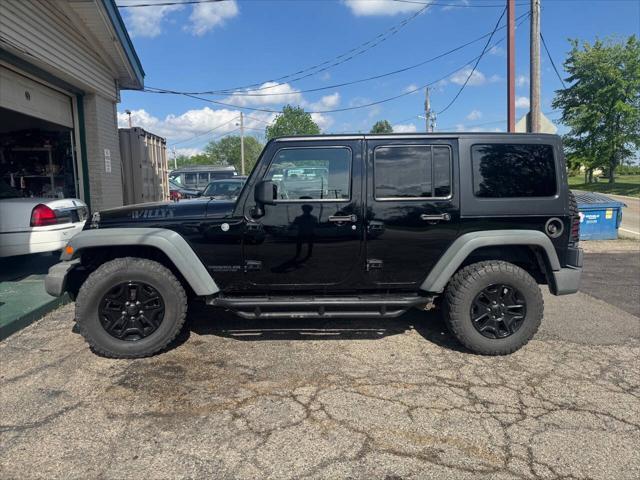 used 2014 Jeep Wrangler Unlimited car, priced at $11,995