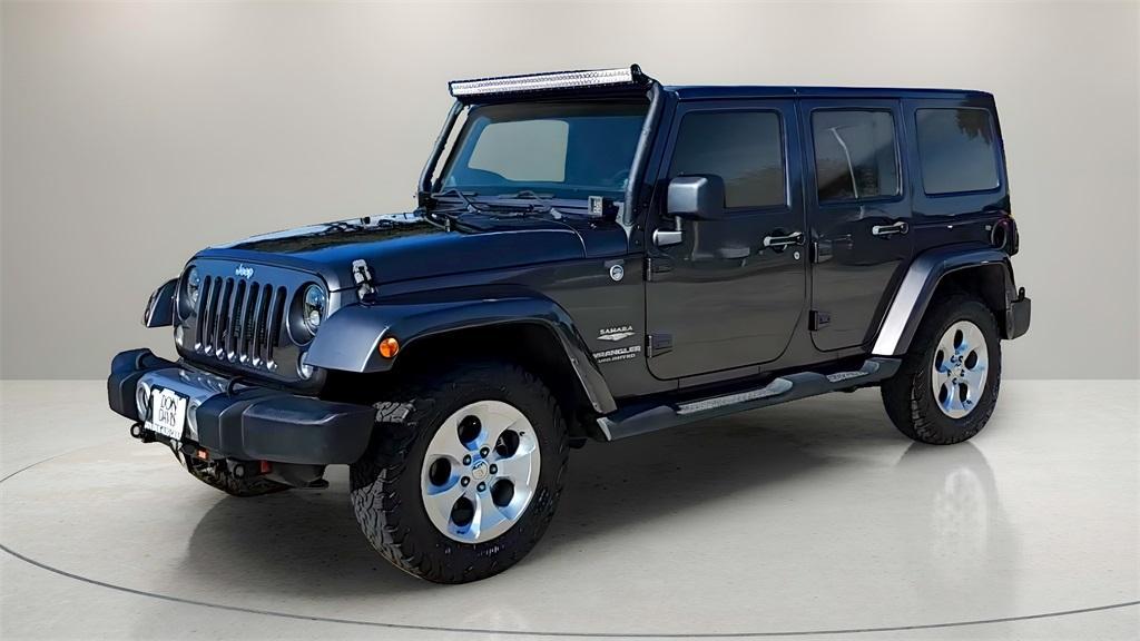 used 2014 Jeep Wrangler Unlimited car, priced at $19,849