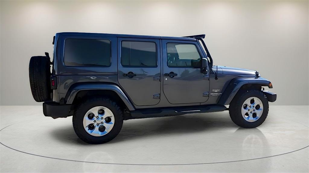 used 2014 Jeep Wrangler Unlimited car, priced at $19,849