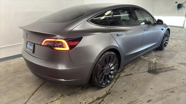 used 2023 Tesla Model 3 car, priced at $30,795
